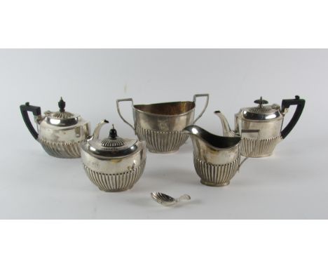 A large silver two handled Sugar Bowl, with half reeded body and a smaller similar Cream Jug, Chester c. 1901; an attractive 