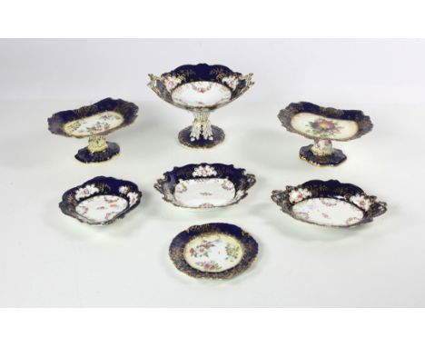 An attractive Royal blue ground floral decorated 25 piece porcelain Dessert Service, consisting of 15 plates & 10 tall tazzi 