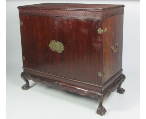 An attractive Chippendale style mahogany Rug Chest, the rectangular rope edge top over two figured doors with heavy engraved 