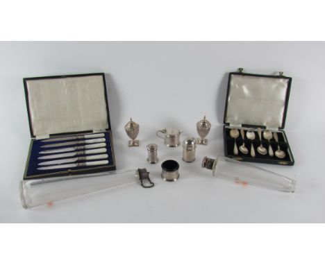 Two conical shaped silver mounted glass Flasks; a cased set of 6 silver mounted mother-o-pearl handled Fruit Knives, a cased 