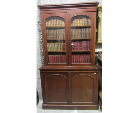 A good Victorian mahogany Bookcase, with two arched glazed doors over two arched panel doors below, 218cm x high x 122cms wid