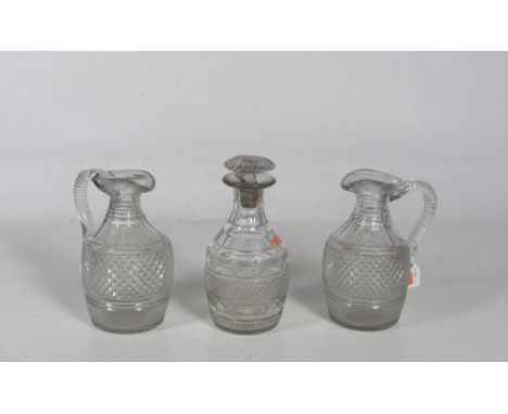 A rare pair of early Waterford cutglass Claret or Water Jugs c. 1790, with thumb and hob nail cut; and a similar cutglass Dec