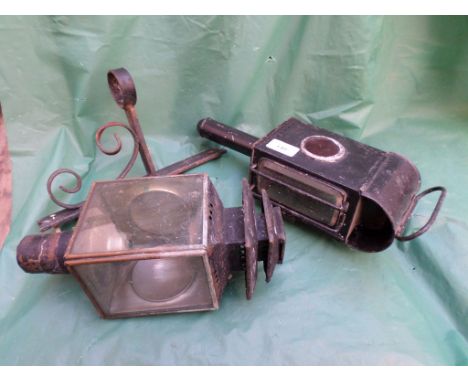 Railway paraffin lamp together with another with iron wall mount