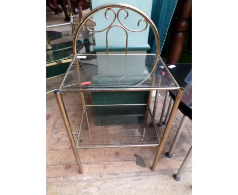 A brass framed double glass shelf display table 