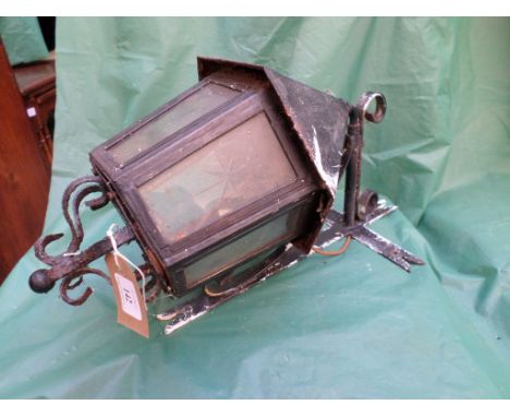 Metal cased 6 glazed panel converted light fitting with wall bracket