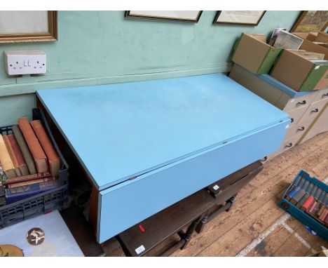 Light blue mid-twentieth century drop leaf rectangular top formica kitchen table