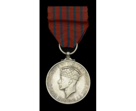 A good Second War G.M. awarded to Mr. R. E. Robinson, a Draughtsman with the Gas Light and Coke Company, for his outstanding 