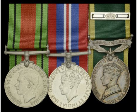 Three: Captain R. W. Wood, Manchester Regiment, later Royal Army Ordnance Corps  Defence and War Medals 1939-45; Efficiency M