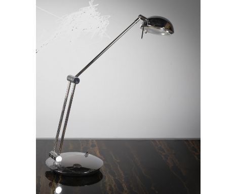 AN ADJUSTABLE CHROME SWIVEL DESK LAMP, 1970s, circular base.