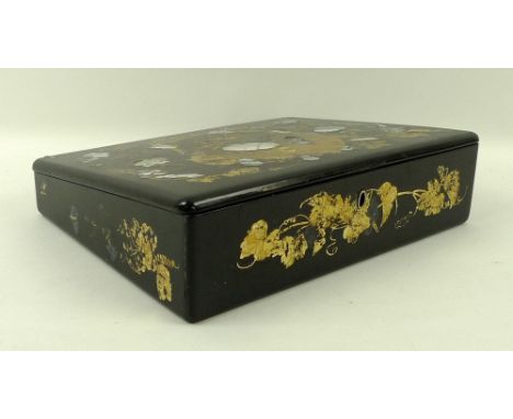 A Jennens and Bettridge papier mache writing slope, 19th century, the black Jappaned ground inlaid with mother of pearl, with