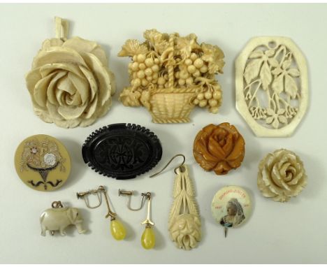 A collection of assorted jewellery comprising a 19th century bone and marine ivory brooch. modelled as grapes and a basket, t