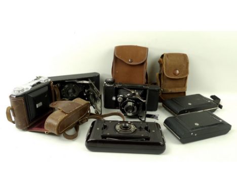 A Kershaw eight-20 Penquin folding camera in a canvas slip case, Ensign Epsilon Folding Camera in leather case, a Soho Limite