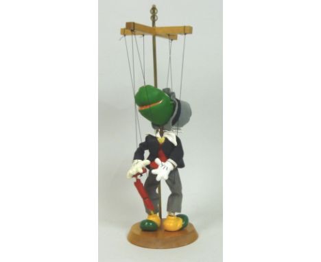 A Pelham puppet of Jiminy Cricket, number 475 out of 5000, circa 1990s, with label and stand, boxed. 