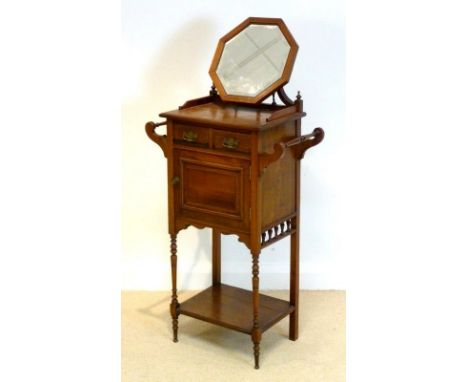 A late Victorian walnut shaving table, circa 1880, the bevelled octagonal plate on a telescopic support above a galleried rec