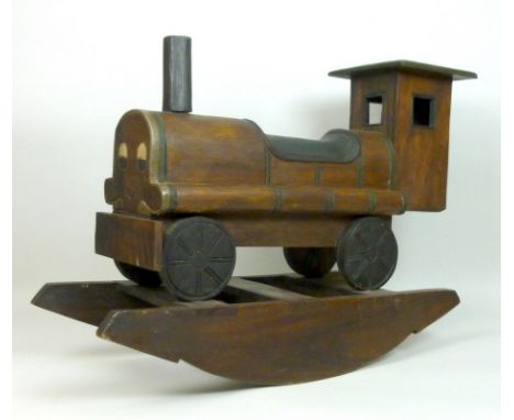 A scratch built 'Thomas' type tank engine rocker, of stained wood, with a smiling face to the front boiler, 80 by 31 by 57cm.