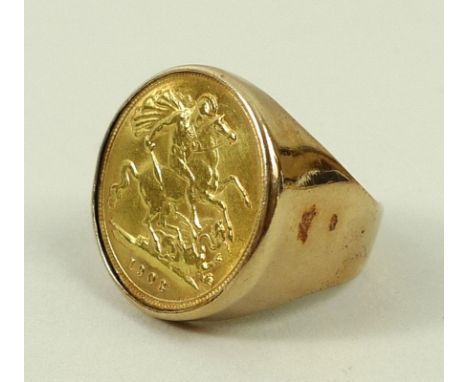 An Edward VII 1903 gold half sovereign, mounted within a gentleman's 9ct gold ring, size N, 8.8g total weight. 