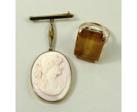 A 9ct gold ring set with a rectangular amber coloured quartz, size L, together with a cameo pendant brooch in a 9ct gold sett