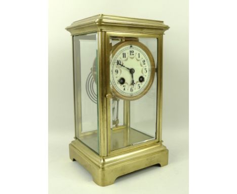 A four glass French mantel clock, early 20th century, the eight day striking movement with mercury pendulum, the dial painted