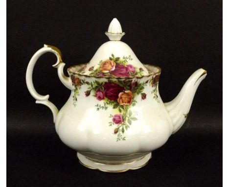 A Royal Albert part tea service, decorated in the Old Country Roses pattern, comprising a tea pot, hot water pot, two milk ju