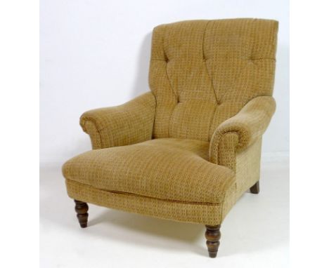 An Edwardian style easy armchair, button back, oatmeal patterned upholster, turned legs, 88 by 102 by 95cm high.