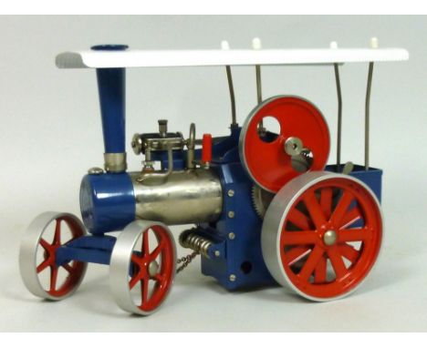 A Wilesco 'Old Smoky' steam roller tractor, complete with original instructions, together with a set of dominoes, playing car