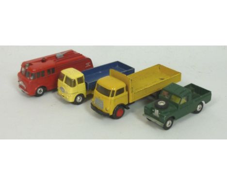 A collection of die cast Dinky, Corgi and a Lion flatbed DAF, including, two Dinky fire engines, Lesney Esso petrol pumps, a 
