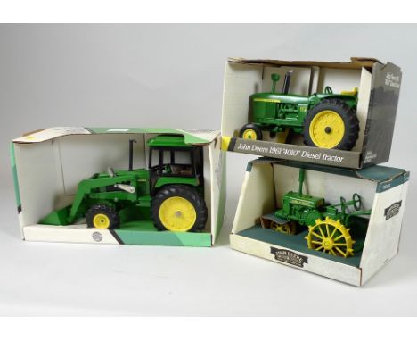 A large scale 1961 4010 Diesel Tractor, a No. 5578 John Deere 2755 Utility Tractor with End Loader and a No. 5787 John Deere 