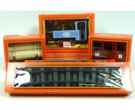 A Mamod SL1 live steam, O gauge, 0-4-0 tank engine locomotive, light blue, rolling stock, including log wagon, and M.R. red c