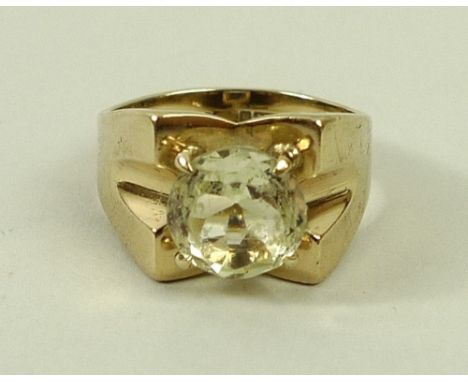 A 9ct gold and citrine solitaire ring, size J, 3.8g. 