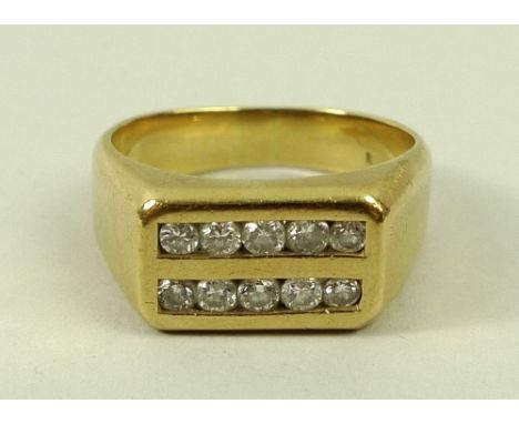 A gentleman's 18ct gold and diamond ring, the central rectangular gold setting with two rows of five diamonds, each approxima