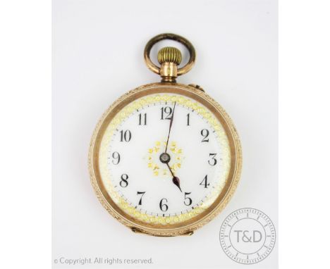 A ladies Swiss fob watch, the white enamel dial with black Arabic numerals and gilt detail, within decorative gold case with 