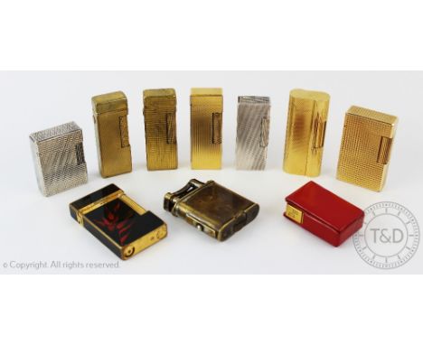 A collection of ten vintage cigarette lighters, comprising a Dunhill plated 'slide wick' lighter, initialed and dated 27/12/4