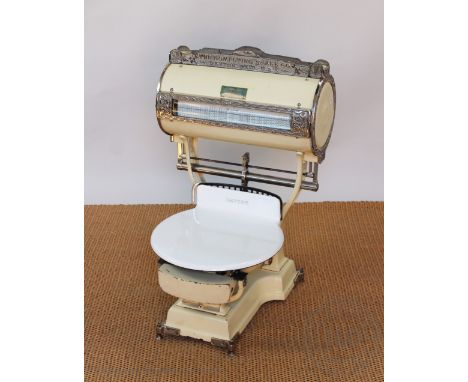 A vintage American shop fitting weighing scales by Computing Scale Company of Dayton Ohio, early 20th century, painted metal,