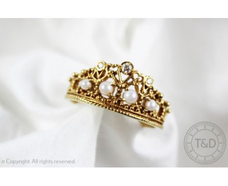 An unusual 18ct gold, pearl and diamond 'crown' ring, designed as a crown set with three diamonds and four pearls, size S/T, 