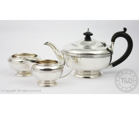 A silver bachelor's tea service, I S Greenberg and Co, Birmingham 1927, each of circular form, with ebonised handle and finia