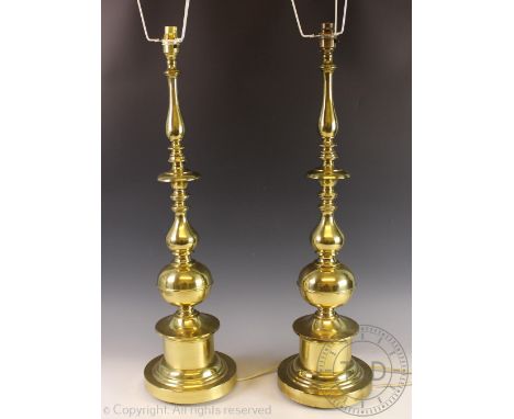 A pair of Dutch style brass table lamps, with pleated cream shades, 98cm high in total (2)   CONDITION REPORT:  Lighting lots