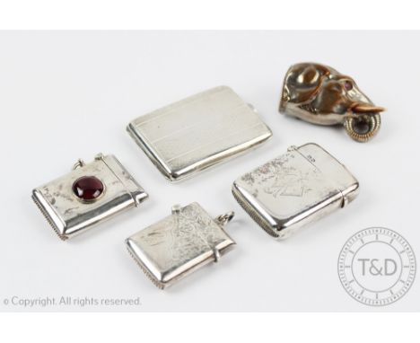A collection of four silver vesta cases, comprising; William Hair Haseler Birmingham 1901, with red cabochon panel to centre,