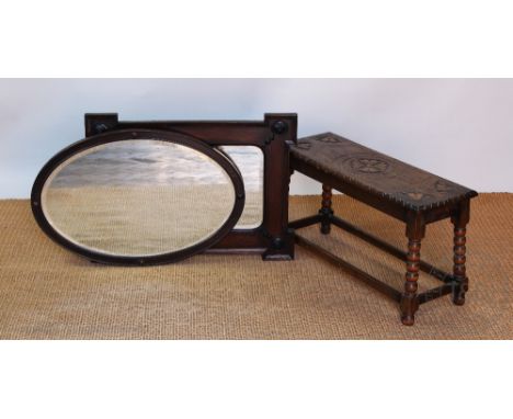 A 1920's oak and beech long stool, of 17th century style, 42cm H x 76cm W, with two 1920's oak mirrors (3)