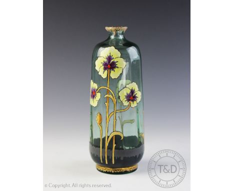 A French Art Nouveau glass bottle vase, externally enamelled with floral sprays and flower heads, flared rim, 21cm high   CON