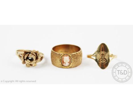 Three gold rings, to include; a cameo set 9ct yellow gold band with textured finish, weight 7gms, a further gold ring with ro