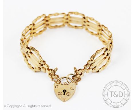 A 9ct gold gate type bracelet with padlock clasp and safety chain, gross weight 16.4gms 