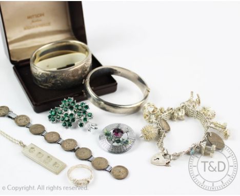 A collection of silver jewellery, to include; an ingot pendant Sheffield 1978, and attached chain, a silver hinged bangle and
