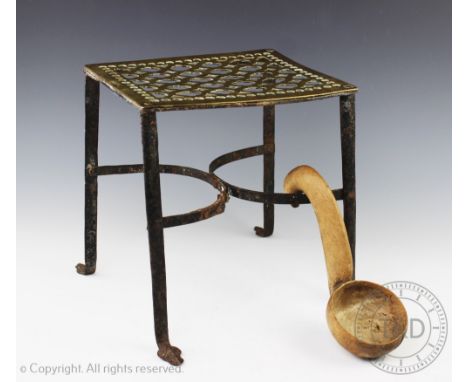 A carved sycamore Lletwad/ladle, with hollowed bowl and curved terminal, 22cm long and a early 19th and later century brass a