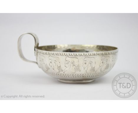 An Edwardian silver bowl, Nathan and Hayes, Chester 1910, decorated with a continuous frieze of Greecian revival portrait bus