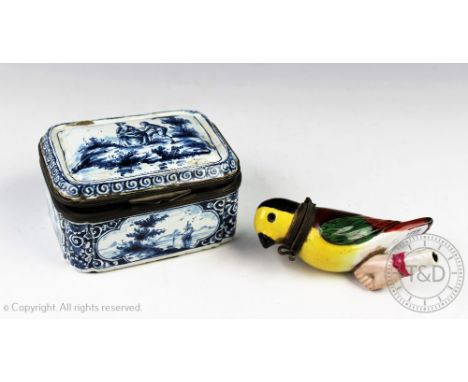 An 18th century continental blue and white enamel box and cover, the top decorated with lovers in a garden, the sides with la