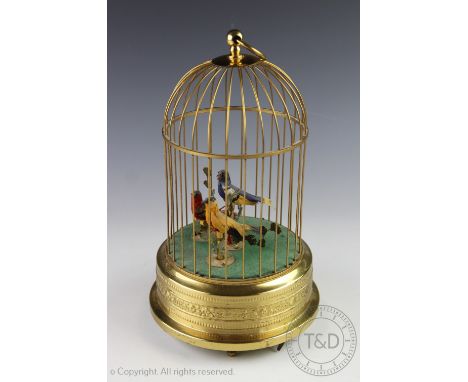 A West German gilt brass singing bird automaton, with three birds under a dome, 27cm (at fault) CONDITION REPORT: All three b