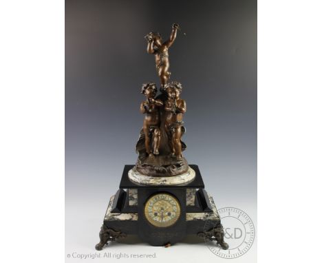 After Emile Bruchon, a large French Belle Epoque mantel clock, the slate and marble case enclosing a floral gilt face with Ar