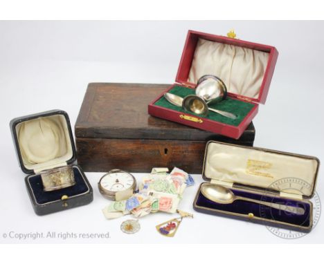 A silver open face pocket watch, London 1933, along with a silver napkin ring, cased, an egg cup and spoon christening set, c