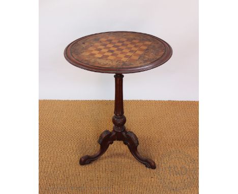 A Victorian inlaid walnut games table, with circular top, on carved tripod base, 72cm H x 58cm diam