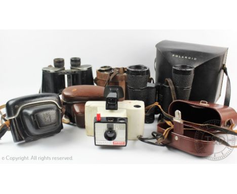 Five pairs of vintage binoculars, comprising, Carl Zeiss Jenoptem 10x50, Ross of London 9x35 Stepruva, Lieberman & Gortz 7x50